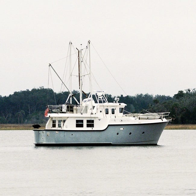 grey and white trawler