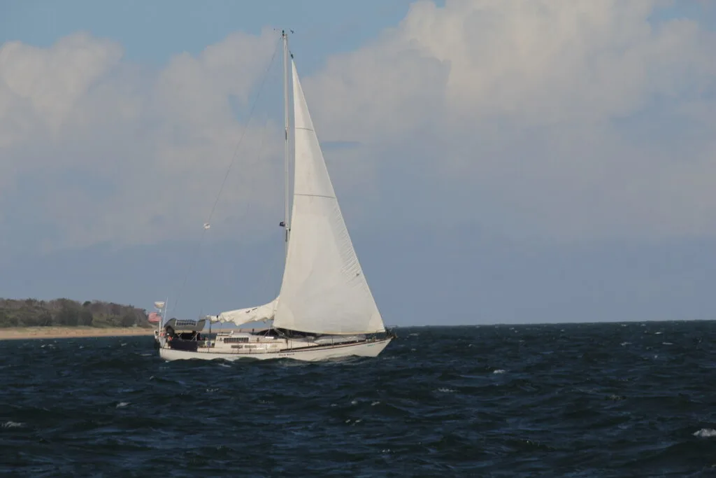 sailboat sailing under headsail