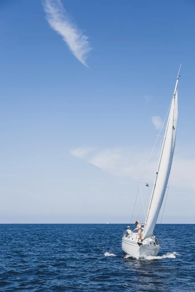 sailboat sailing towards camera